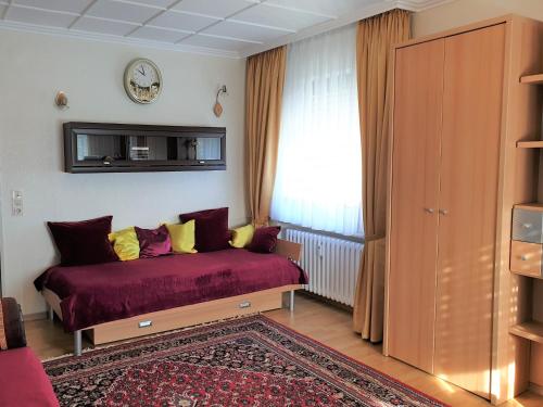 a bedroom with a bed and a window at 60 qm mit Aussicht in Konz in Konz