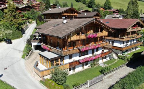 an aerial view of a large house at Wellnessappartements Margit in Alpbach