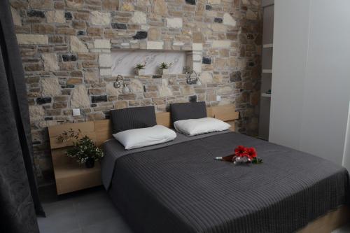 Ένα ή περισσότερα κρεβάτια σε δωμάτιο στο Euphoria - South Crete Villas