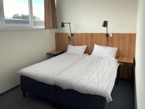 Una cama o camas en una habitación de Muontis