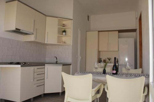 Kuchyň nebo kuchyňský kout v ubytování Beach Apartment Don Filippe