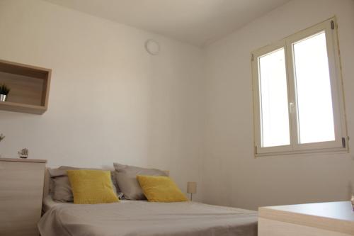 Postel nebo postele na pokoji v ubytování Beach Apartment Don Filippe