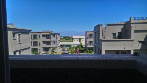 a view of some buildings from a balcony at Fun Homestay in Jian