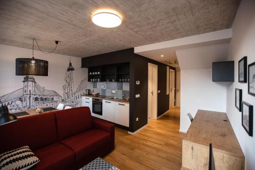 Kuchyň nebo kuchyňský kout v ubytování Postcard City Apartments