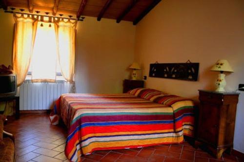 Katil atau katil-katil dalam bilik di Il Pozzo Romano