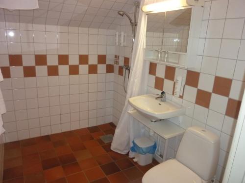 Koupelna v ubytování Nya Pallas Hotel
