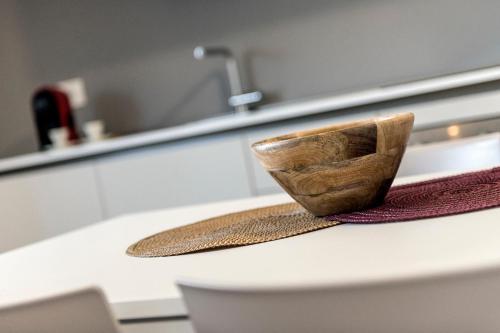 a wooden block sitting on top of a kitchen counter at Paduina3 Comfort Apartments in Trieste