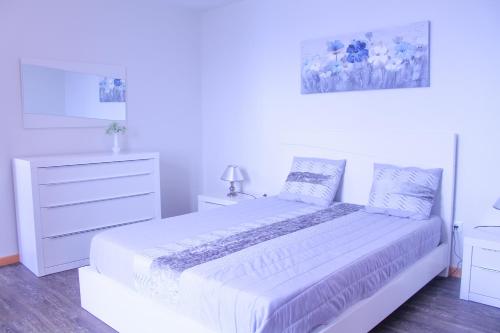 Postel nebo postele na pokoji v ubytování House of Massapez | Calheta