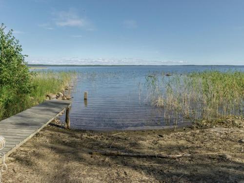 a dock on the side of a body of water at Holiday Home 6440 by Interhome in Pihlajaniemi