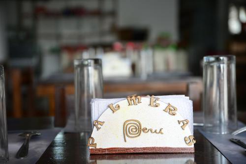 a napkin with the word food on it on a table at Qallwa Asia in Asia