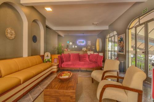 Χώρος καθιστικού στο Iguassu Flats Hotel