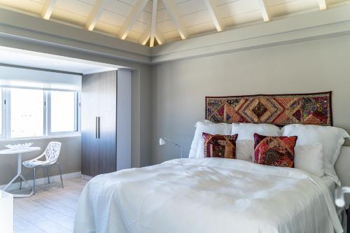 Postel nebo postele na pokoji v ubytování Ocean Z Boutique Hotel