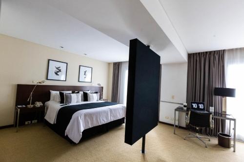 Postel nebo postele na pokoji v ubytování 474 Buenos Aires Hotel