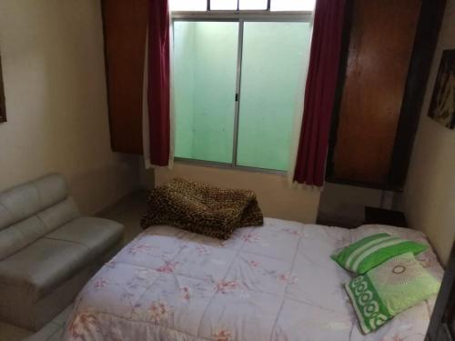 Ένα ή περισσότερα κρεβάτια σε δωμάτιο στο centro piria apartamento 2