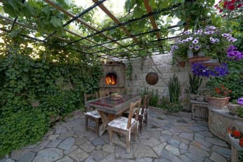 Jardin de l'établissement Safran Cave Hotel
