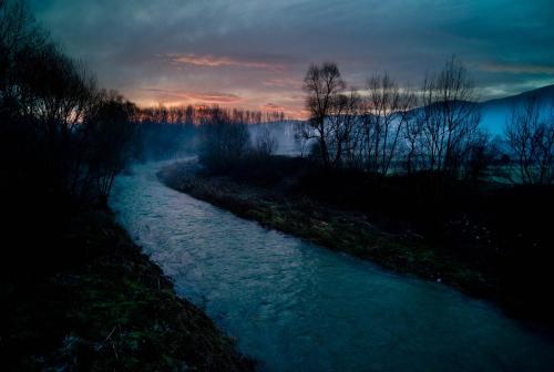 a view of a river at sunset at Boutique Hotel Palazzo Corso Umberto in Boiano