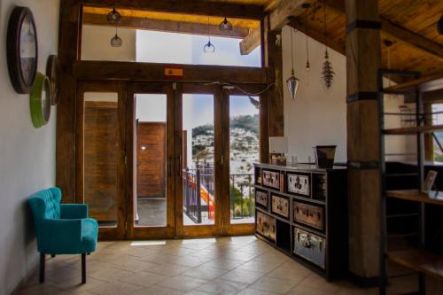 A kitchen or kitchenette at Hotel Santiurde SOLO ADULTOS