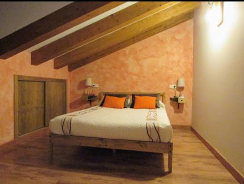 Ένα ή περισσότερα κρεβάτια σε δωμάτιο στο Casa rural Cachilo