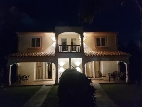 a night view of a house at night at Résidence Les Badamiers --- Exotica Villa in Centre de Flacq