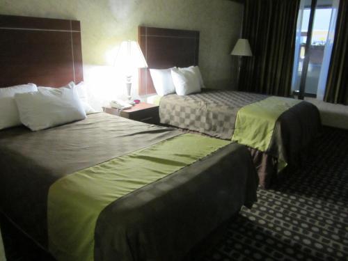 Katil atau katil-katil dalam bilik di Days Inn by Wyndham Midland