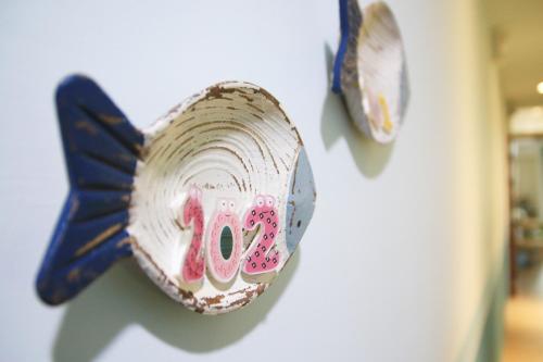a shell on a wall with the number forty on it at The Wind BnB Ⅱ in Budai