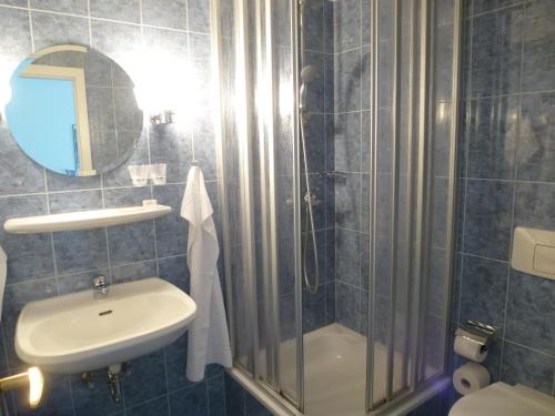 Ein Badezimmer in der Unterkunft Hotel Conrad Erzgebirge
