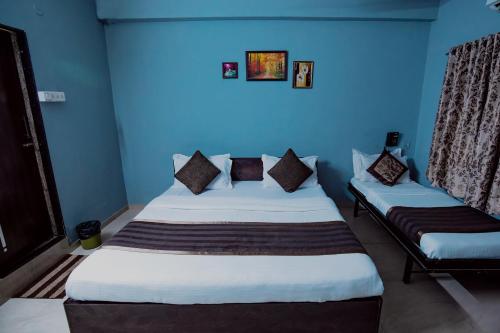 Postel nebo postele na pokoji v ubytování Nova Hotel Star Palace
