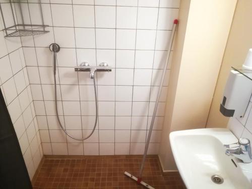 Kylpyhuone majoituspaikassa Hotelli Kaatrahovi