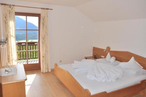 Photo de la galerie de l'établissement Ferienwohnungen Baumannsog, à Schenna