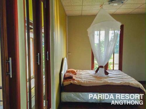 Postel nebo postele na pokoji v ubytování Parida Resort