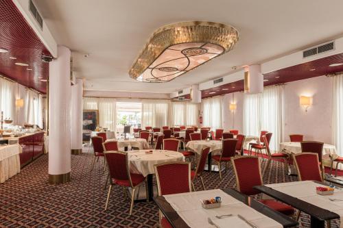 Restaurant o un lloc per menjar a Agora' Palace Hotel