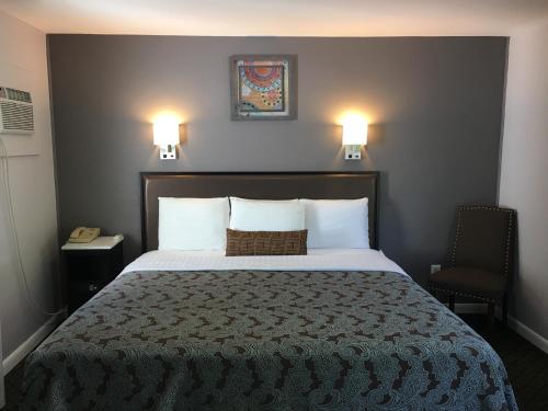 Scottish Inns Milfordにあるベッド