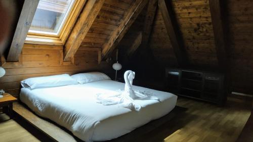Un pat sau paturi într-o cameră la Era Borda