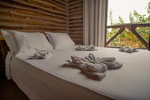 Una cama o camas en una habitación de Mar da Lua