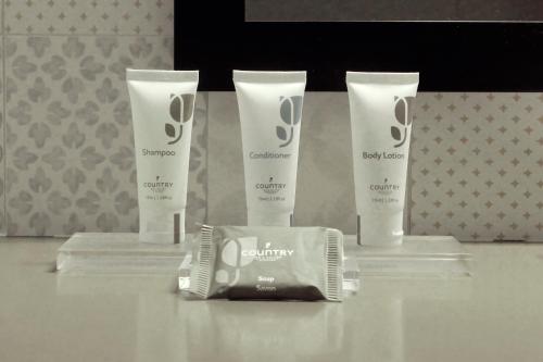 a group of four products on a table at Country Inn & Suites by Radisson, Annapolis, MD in Annapolis