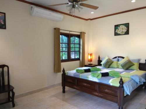 מיטה או מיטות בחדר ב-Stella Resort