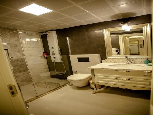 Koupelna v ubytování Lion Park Suites & Residence Hotel