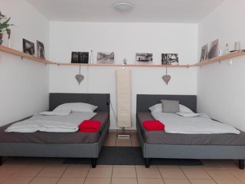 Katil atau katil-katil dalam bilik di Borálom Stúdió Apartman Tokaj
