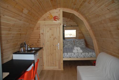 Tempat tidur dalam kamar di Le Pod de L'Adret