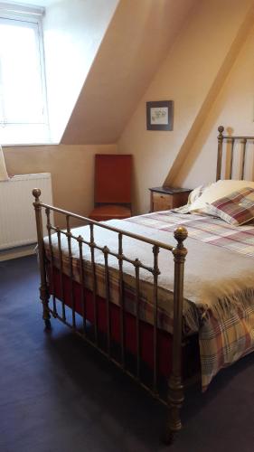 Giường trong phòng chung tại Demeure centre village