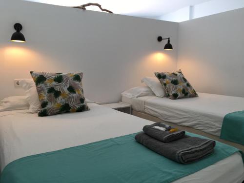 Tempat tidur dalam kamar di Apartamentos Villa Nadine