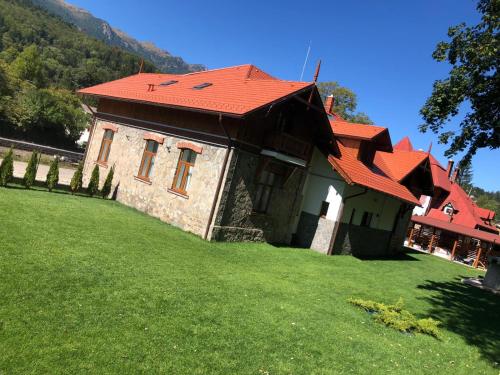 Photo de la galerie de l'établissement Pensiunea Piscul Cainelui, à Sinaia