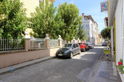 a car parked on the side of a street at Sari Pension in Edirne