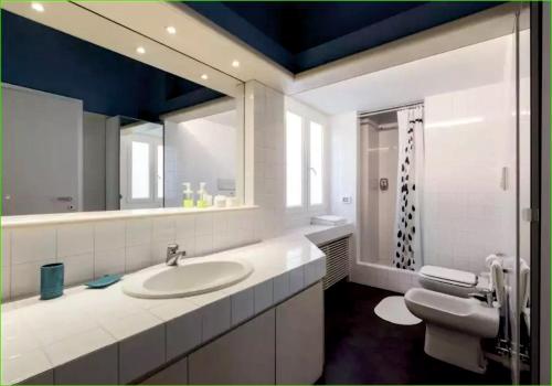 A bathroom at Carlos BCS2 - Sanremo Center Suite -