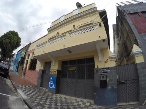 a building on the side of a street at Aldeia Hostel in Manaus