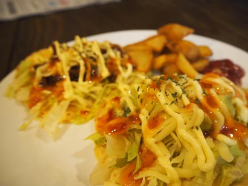 a white plate of food with pasta and vegetables at TRIP BASE COCONEEL in Akiyoshi