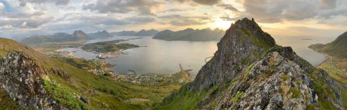 a view of a large body of water from a mountain at Myre Kysthotell in Myre