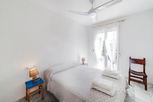 A bed or beds in a room at Residencial Las Redes - 19