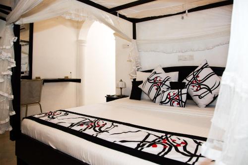 Cama o camas de una habitación en Suriya Arana