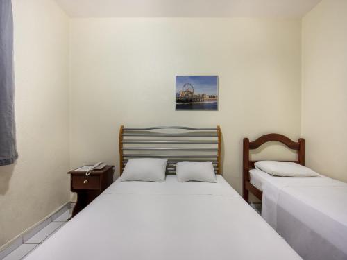 Katil atau katil-katil dalam bilik di Netuno Beach Hotel